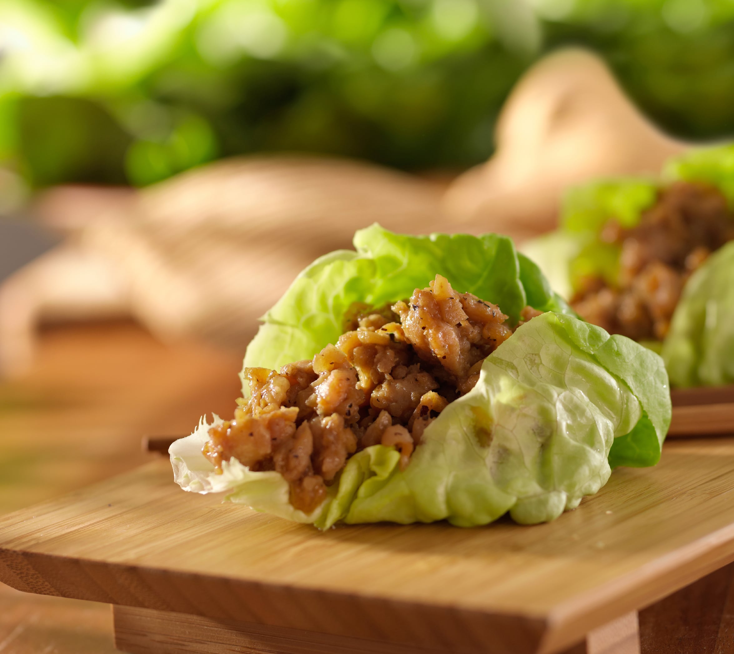 Asian lettuce wrap with minced chicken and seasonings